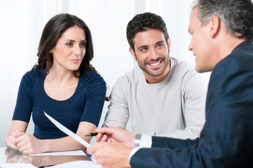 couple-asking-questions-to-used-car-saleman