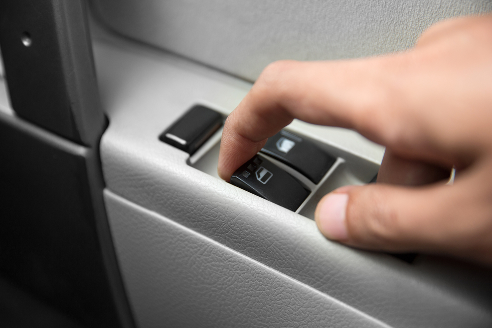 A portrait of windows controls and adjustments. Car window controls