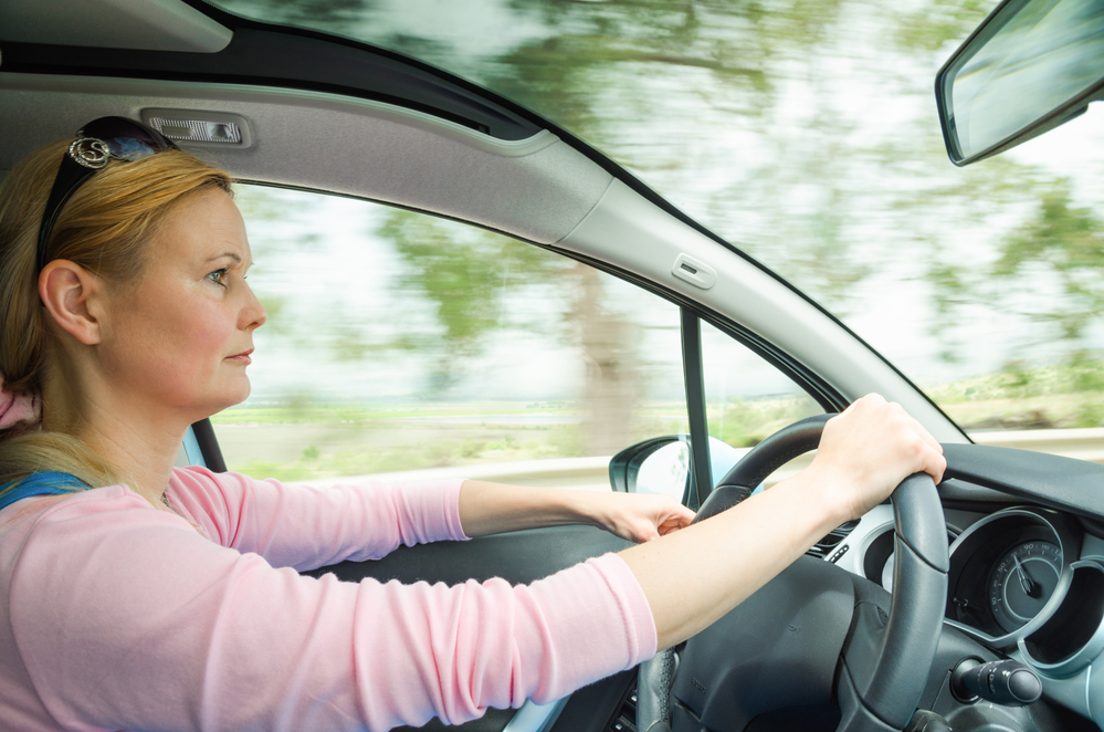 woman-safely-and-slowly-driving